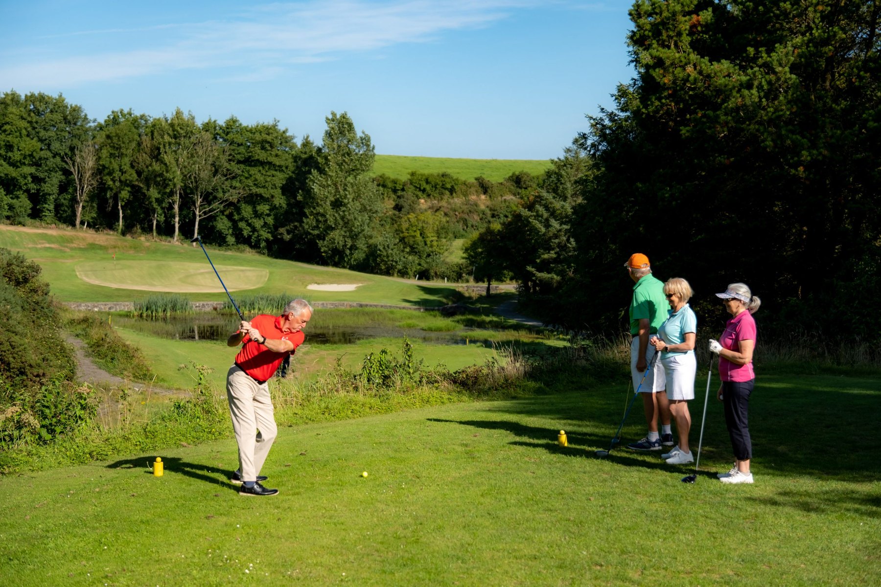 Golfers on the tee at HH Golf Club